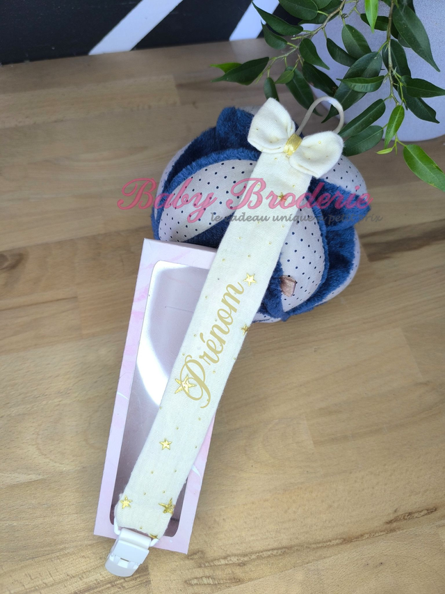 Attanche Tétine Blanc casé à étoile doré 