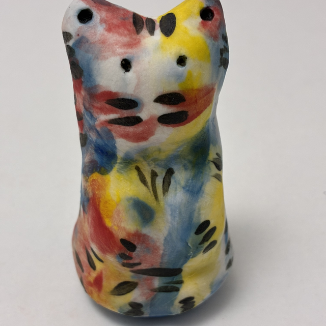 The Rainbow Cat says 'have a nice day, everyday!'