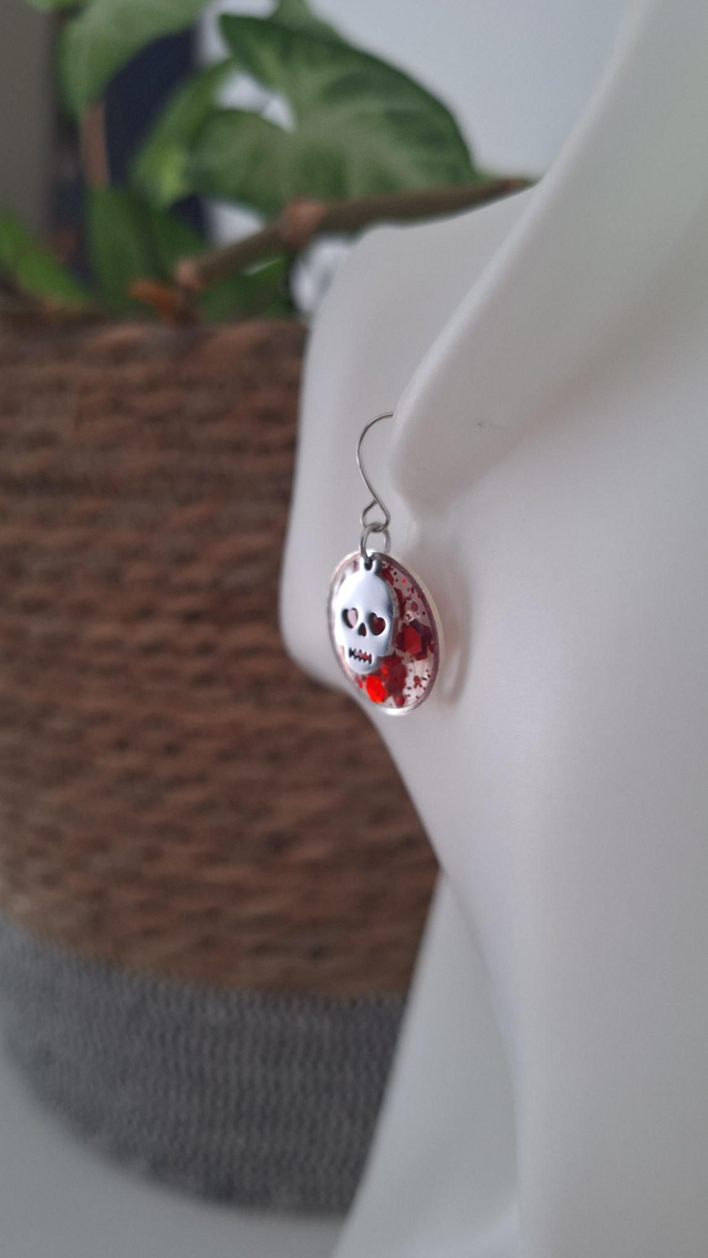 Boucles d'oreilles crâne Halloween argenté/paillettes rouges