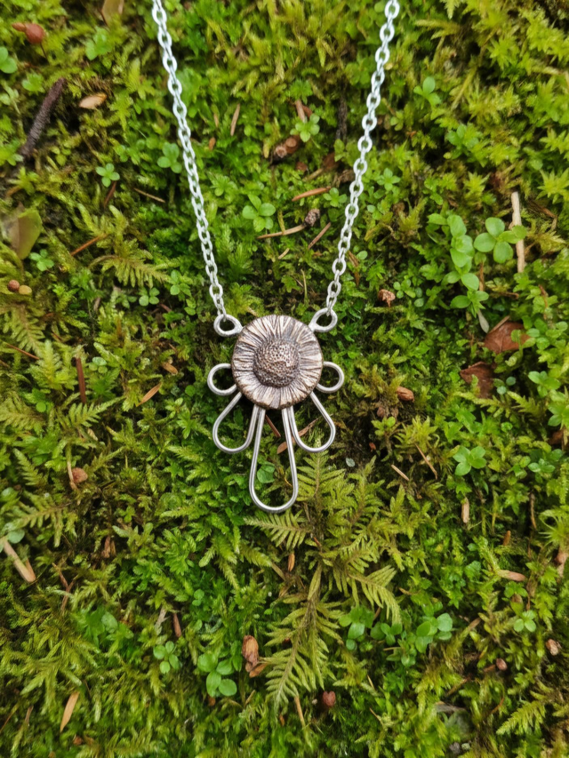 Bronze Sneezeweed on silver &#039;Petal&#039; pendant