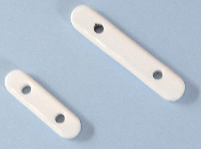 Huismerk: Gordijn Loodstaafjes.