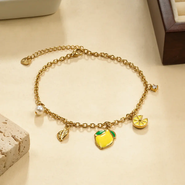 Chaîne de cheville 5 breloques citron jaune