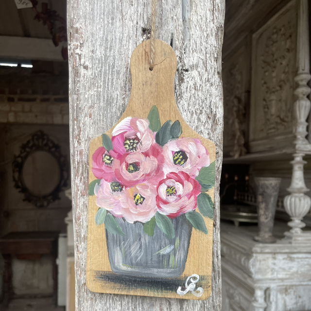 Pot en zinc avec bouquet  de roses.