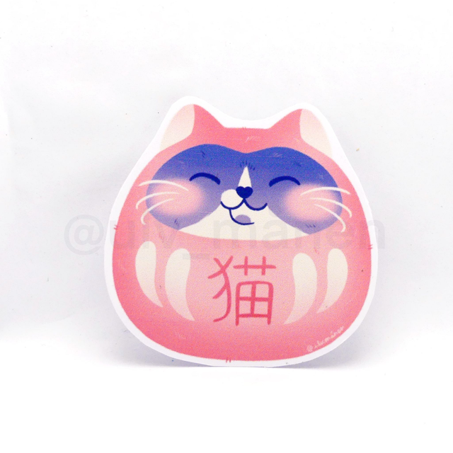 Sticker chat violet daruma japonais 