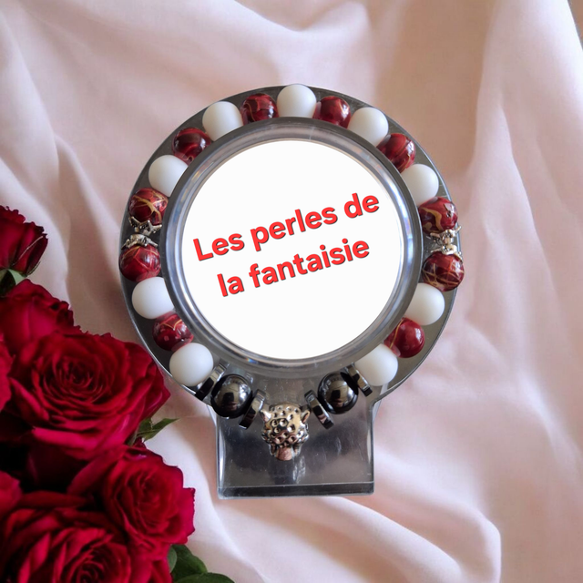 Bracelet perles de verre, perles hématite,breloque centrale léopard