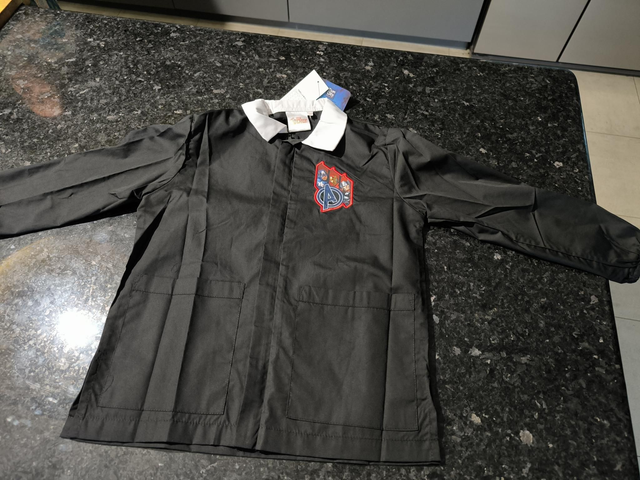 BLOUSE D'ACTIVITÉES AVENGERS 9 ANS