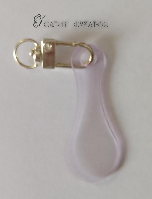 Jeton de caddie violet transparent 