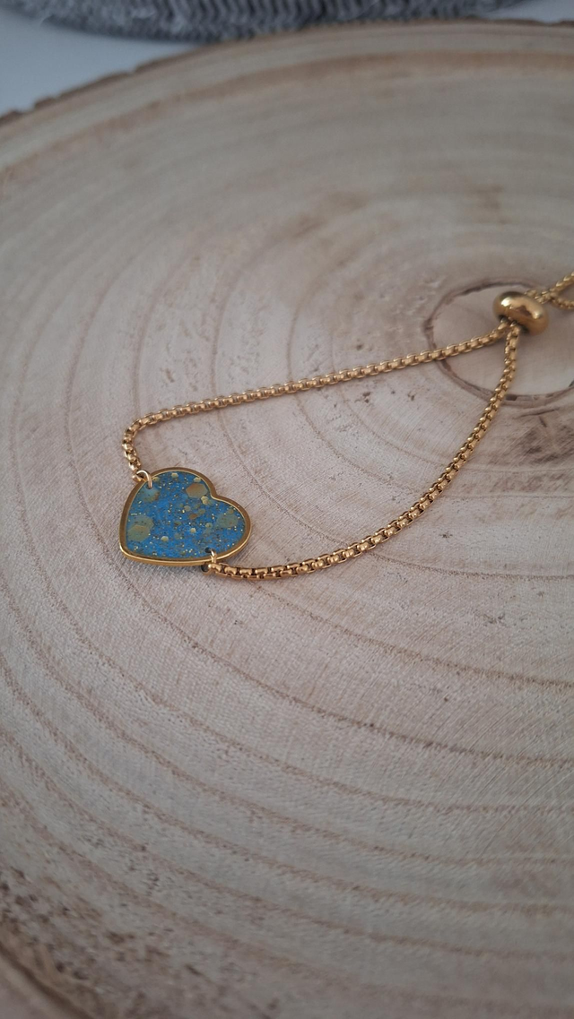 Bracelet à glissière cœur bleu paillettes dorées 