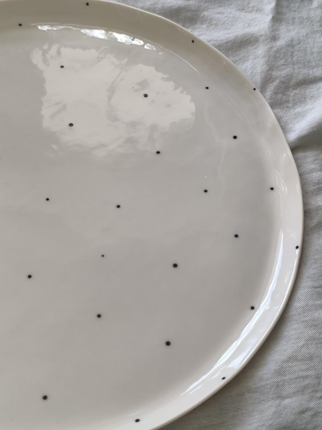 Plate with black dots