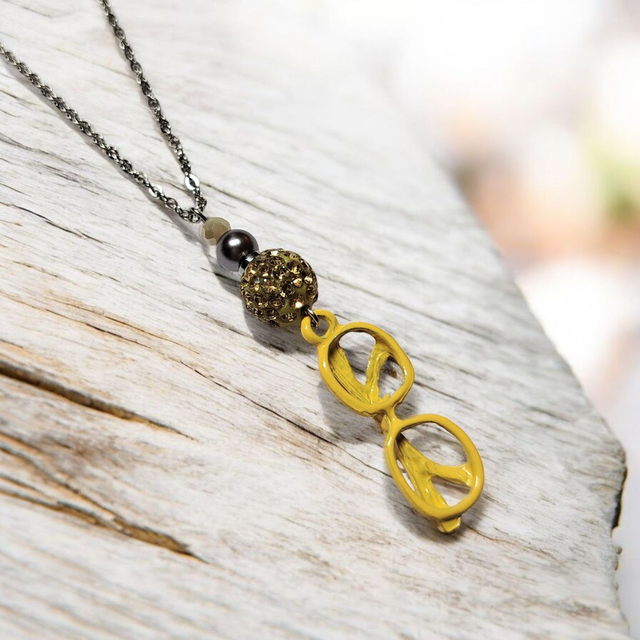 Collier acier inoxydable et cristal jaune lunettes