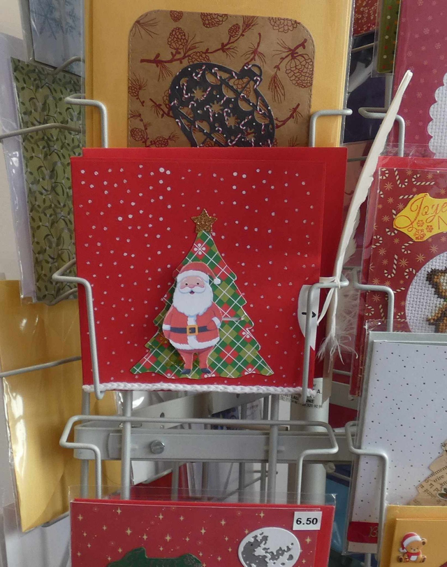 Le père noël souhaite de joyeuses fêtes (carte à tirette)