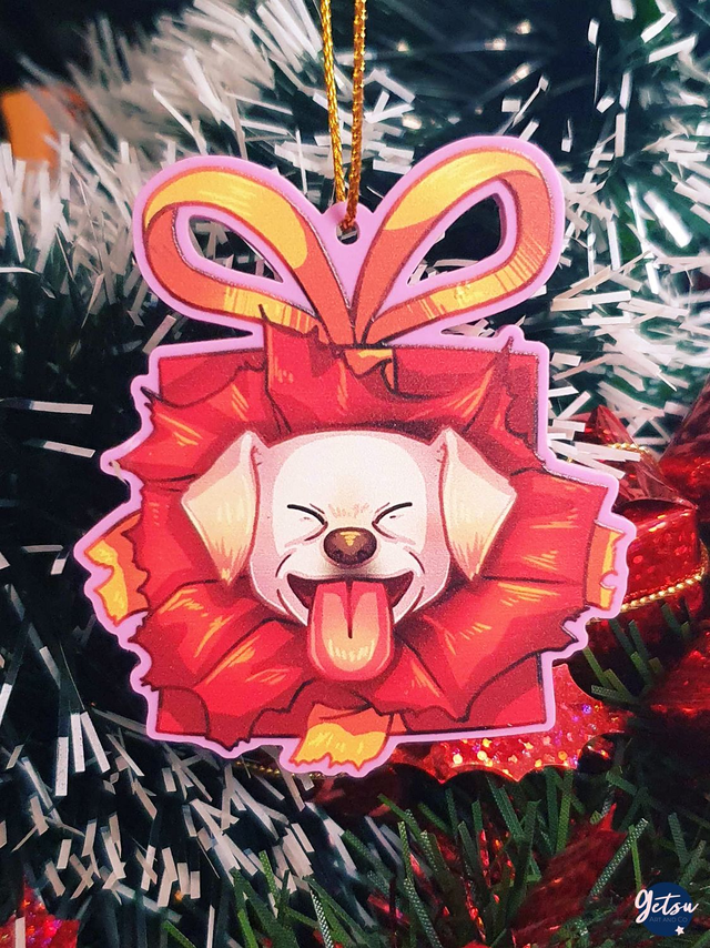 Suspension chien dans un cadeau