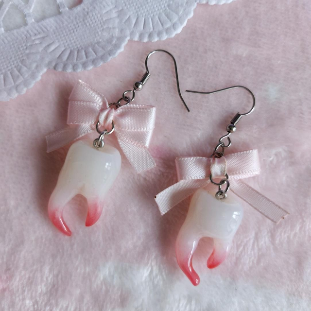 Boucles d'oreilles dents