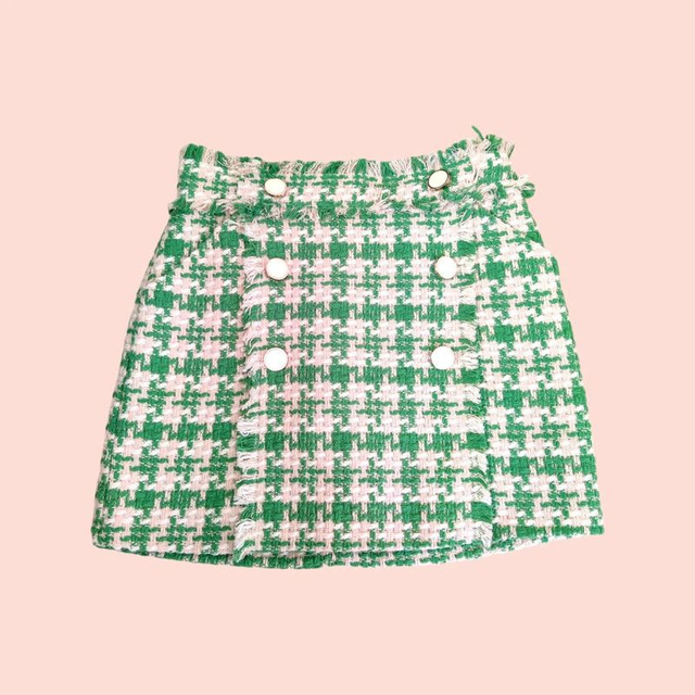 Mini jupe à carreaux T.38