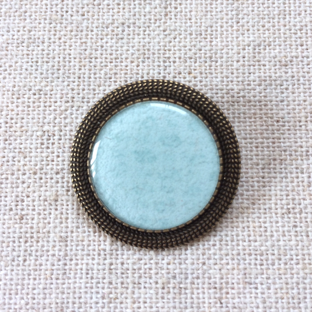 Broche support bronze, papier texturé bleu lagon