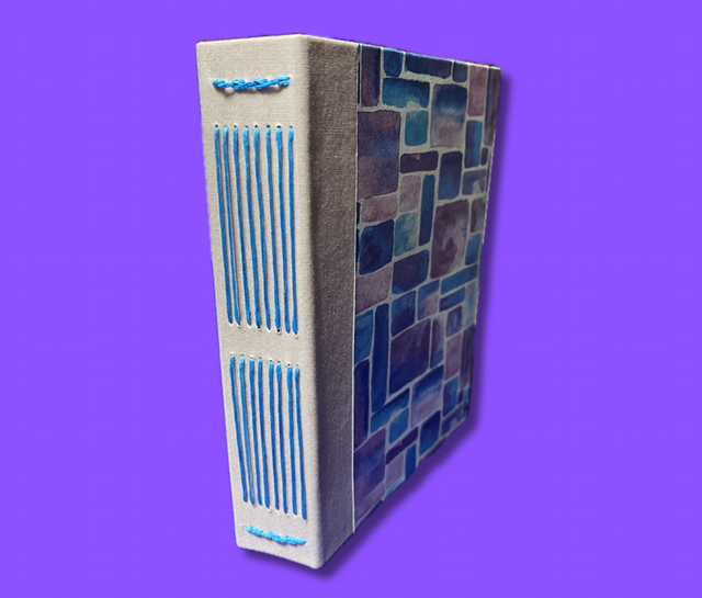 Handcrafted Embroidered Journal with Blue Stitch Spine – Unique Watercolour Tile Design