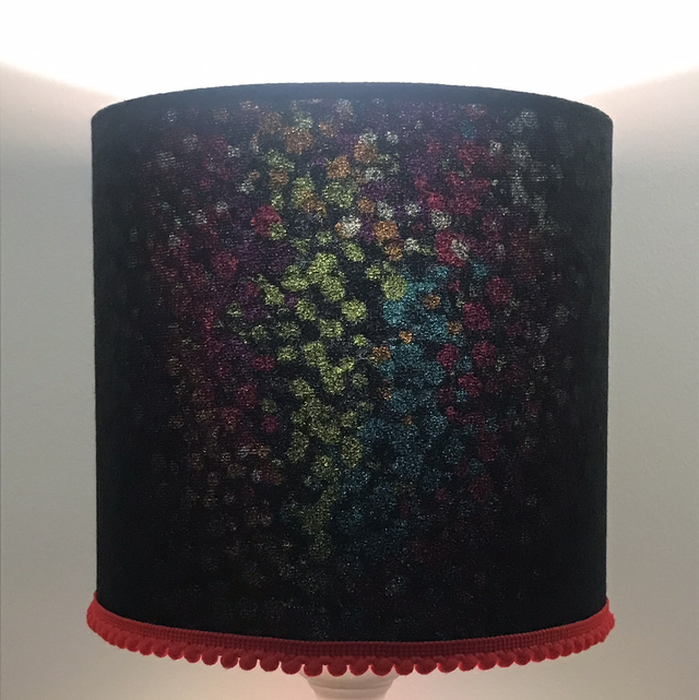 Black velvet on multi with red pom pom trim