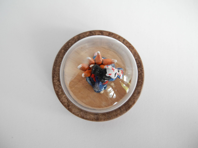 Kitsune disguised as Geisha in a Kimono adorned with waves - miniature pendant for Japan enthusiasts