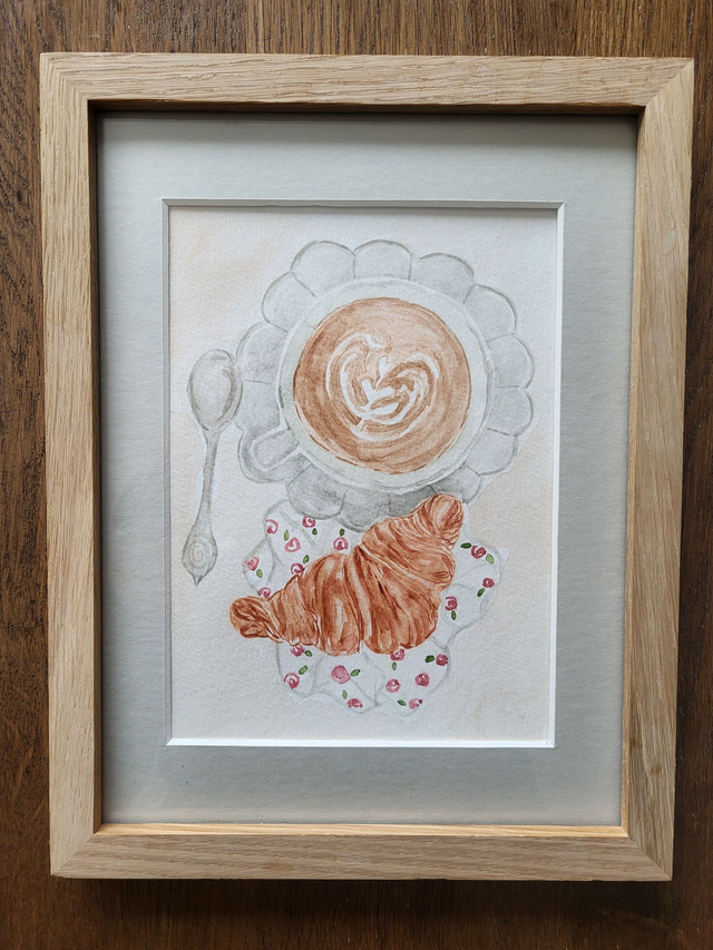 Un croissant et un café 