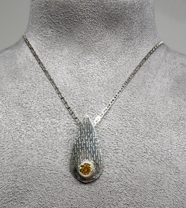 Teardrop with citerine cubic zirconia fine silver pendant