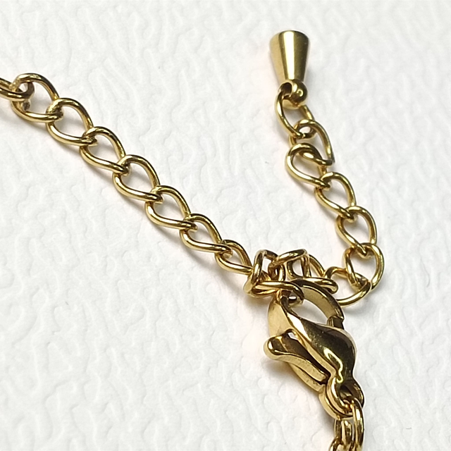 Bracelet ESSENTIEL, Péridot, acier chirurgical doré