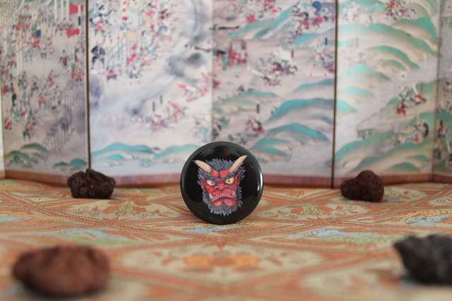 Badge oni - Couverture du Grand Livre des Ryû